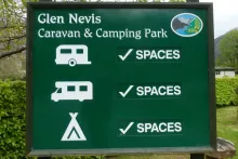 The sign for the Glen Nevis Camping & Caravan Park