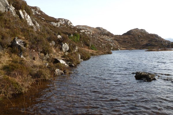 Path skirting the dammed lochan