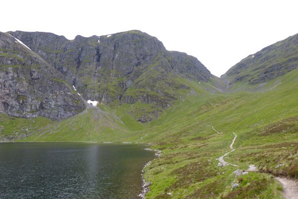 Lochan a Choire with cliffs behind