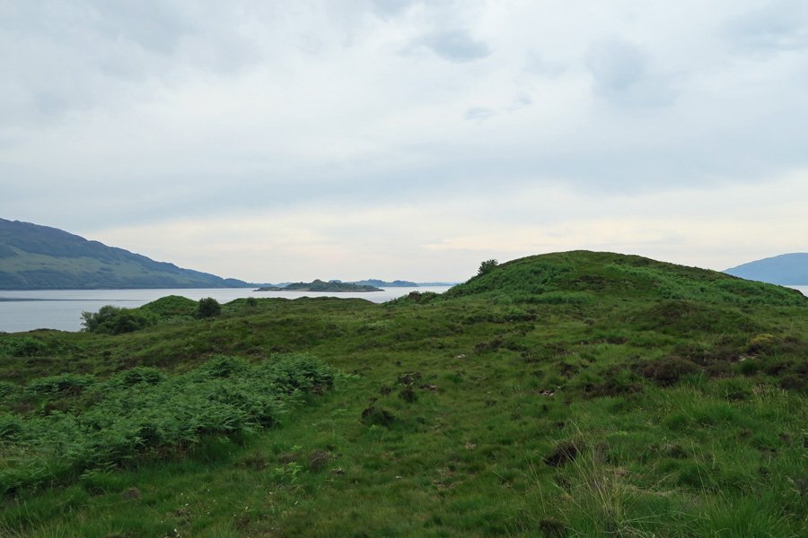 Follow the faint path towards the peninsula
