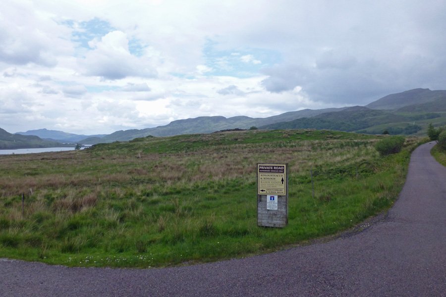 There is a small parking area at the end of the public road at the start of the walk