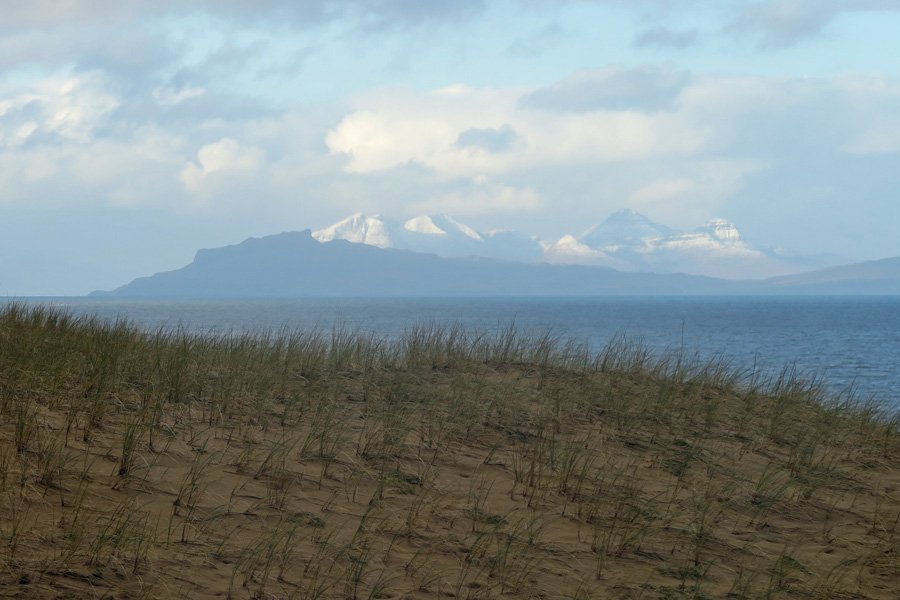 Looking out to The Small Isles from the top of the dunes at Cul na Croise