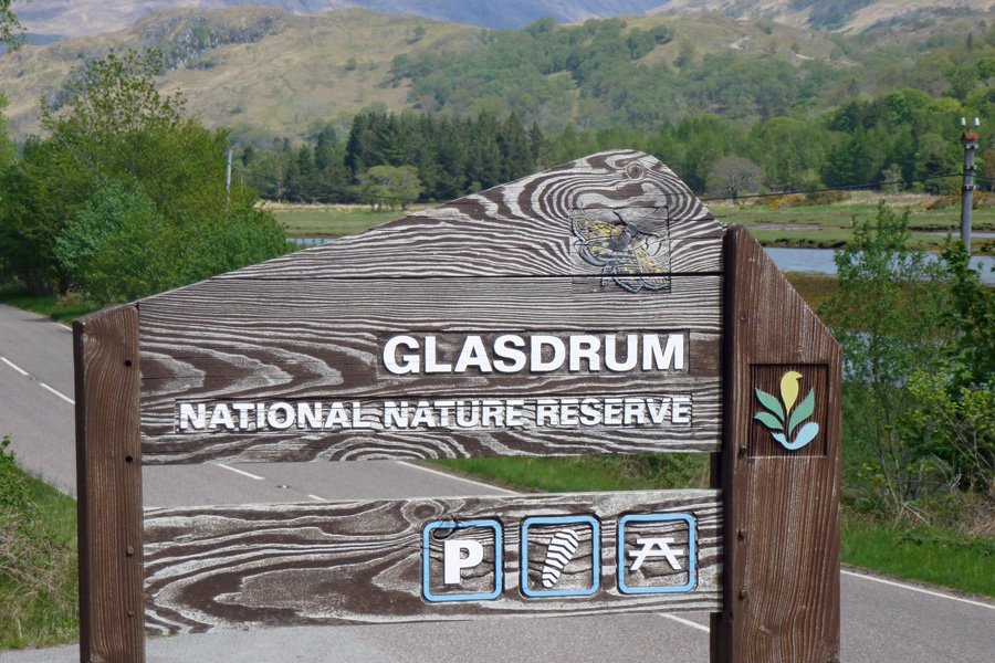 The sign for Glasdrum National Nature Reserve visible from the road