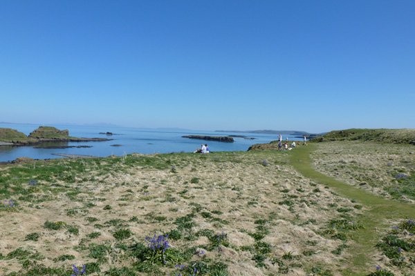 Puffin watchers on the cliffs of Lunga