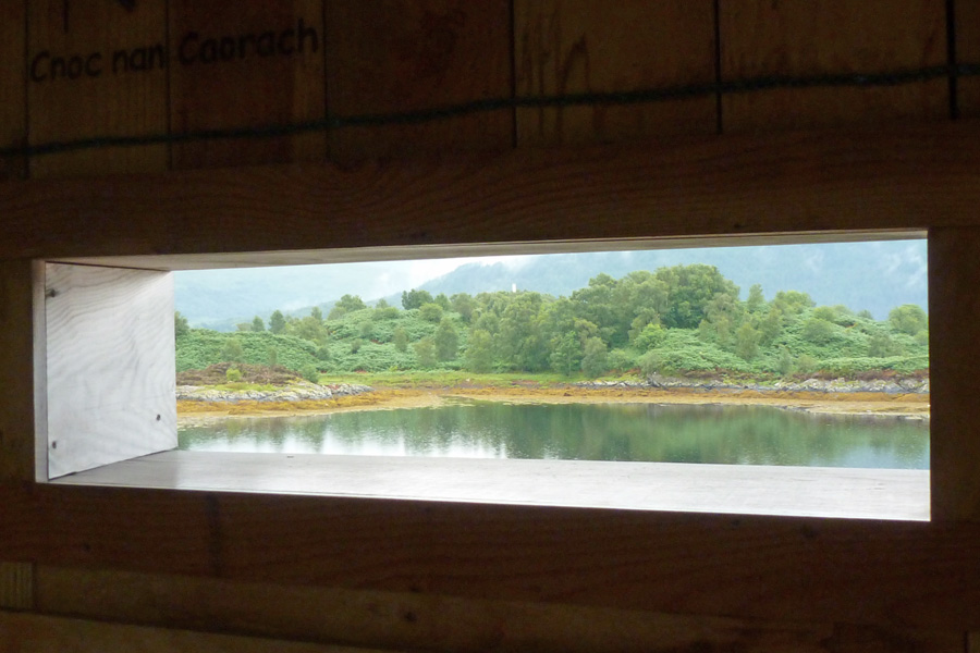 A view through one of the wooden windows at the Garbh Eilean wildlife hide